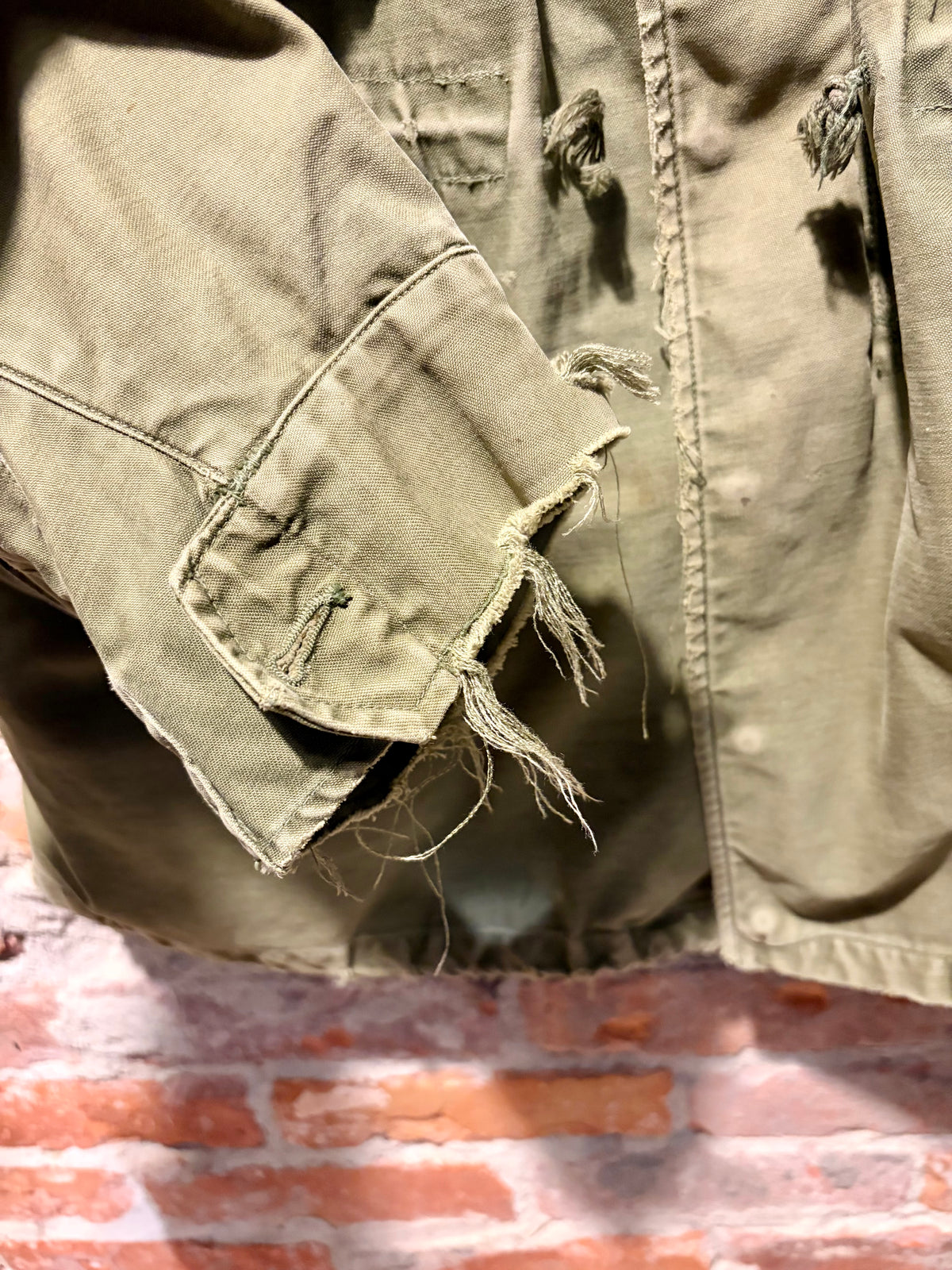 Fraying on Right Cuff on Vintage Distressed Military Cargo Jacket Sz M